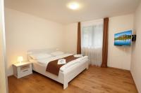 Posteľ alebo postele v izbe v ubytovaní Residence AlpenHeart