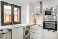 A kitchen or kitchenette at Adriana by Totiaran
