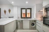 A kitchen or kitchenette at Adriana by Totiaran