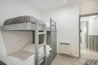 A bed or beds in a room at Adriana by Totiaran