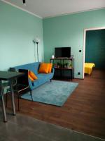 Televízia a/alebo spoločenská miestnosť v ubytovaní Apartament Santo Bartolomeo