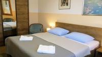 Postel nebo postele na pokoji v ubytování Pension Nataliya