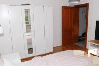 Postel nebo postele na pokoji v ubytování Apartment Magnolija - free parking