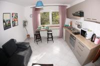 Kuchyň nebo kuchyňský kout v ubytování Apartment Magnolija - free parking