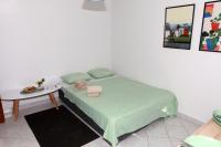 Postel nebo postele na pokoji v ubytování Apartment Magnolija - free parking
