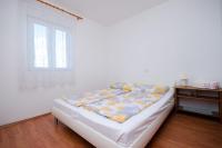 Posteľ alebo postele v izbe v ubytovaní Apartments Pela