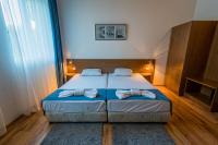Postel nebo postele na pokoji v ubytování Family Park Hotel Kyoshkove
