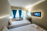Postel nebo postele na pokoji v ubytování Family Park Hotel Kyoshkove