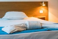 Postel nebo postele na pokoji v ubytování Family Park Hotel Kyoshkove