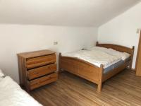 Łóżko lub łóżka w pokoju w obiekcie Pension Reiterhaus