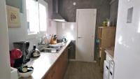 A kitchen or kitchenette at CASA FLAMINGO