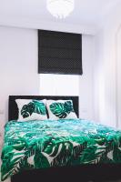 Posteľ alebo postele v izbe v ubytovaní Holiday House Apartament 95m2 Deptak Bogusława