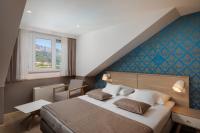 Postel nebo postele na pokoji v ubytování Hotel Tamaris