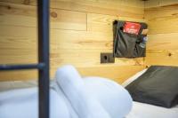Postel nebo postele na pokoji v ubytování Tinto Dreams Hostel