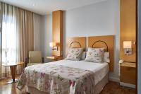 Postel nebo postele na pokoji v ubytování Hotel Don Curro