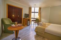 Postel nebo postele na pokoji v ubytování Hotel Don Curro