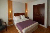 Postel nebo postele na pokoji v ubytování Hotel Don Curro
