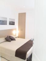 A bed or beds in a room at Le Stanze Del Sole