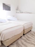 A bed or beds in a room at Le Stanze Del Sole