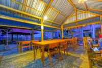 Kuta Circle Homestayにあるレストランまたは飲食店