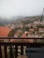 a view of a town from the balcony of a house at Thea Valtessinikou in Valtessiniko