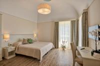A bed or beds in a room at Agriturismo La Peppina