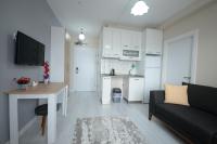 Kuchyň nebo kuchyňský kout v ubytování city59 Suit Otel
