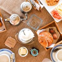 a table topped with different types of breakfast foods at Hotel El Dorado in La Romana