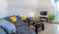 TV a/nebo společenská místnost v ubytování Apartament przy Deptaku