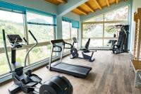 The fitness centre and/or fitness facilities at "Il Segreto" Vista Panoramica sulle Isole Eolie con Piscina, palestra e WiFi