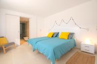 Postel nebo postele na pokoji v ubytování Villa Menorca 16