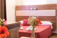 A bed or beds in a room at Hostal Rural La Fonda Del Rocio