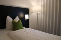 Postel nebo postele na pokoji v ubytování NU Hotel by WMM Hotels