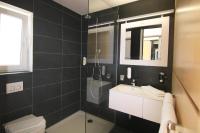 Koupelna v ubytování NU Hotel by WMM Hotels