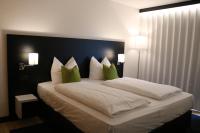 Postel nebo postele na pokoji v ubytování NU Hotel by WMM Hotels