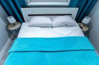 Posteľ alebo postele v izbe v ubytovaní Resort Apartamenty Klifowa Rewal 27