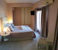 Posteľ alebo postele v izbe v ubytovaní Anemos Hotel