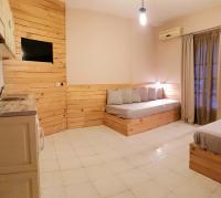 Posteľ alebo postele v izbe v ubytovaní Anemos Hotel
