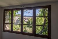 a window in a room with a view at Les Hirondelles in Pont-de-Barret