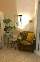 A seating area at Stefanias sunny Acropolis Studio on Drakou pedestrian