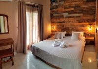 Posteľ alebo postele v izbe v ubytovaní Anemos Hotel