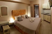 Posteľ alebo postele v izbe v ubytovaní Anemos Hotel