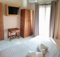 Posteľ alebo postele v izbe v ubytovaní Anemos Hotel