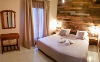 Posteľ alebo postele v izbe v ubytovaní Anemos Hotel
