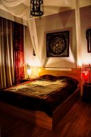Postel nebo postele na pokoji v ubytování Dharma Luxury & Spa Apartment