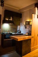 Kuchyň nebo kuchyňský kout v ubytování Dharma Luxury & Spa Apartment