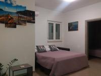 Postel nebo postele na pokoji v ubytování Apartman Nature