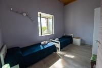 A seating area at "Il Segreto" Vista Panoramica sulle Isole Eolie con Piscina, palestra e WiFi