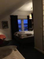 Postel nebo postele na pokoji v ubytování Breidablikk Guesthouse