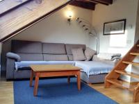 A seating area at Apartament Ca de Gallisca